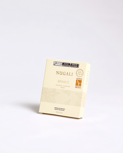 Chocolate Branco premiado, artesanal de alta qualidade, cremoso e feito com ingredientes naturais selecionados.