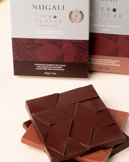 Chocolate Amargo 70% Zero Açúcar Nugali revela o verdadeiro sabor do cacau em uma experiência rica em aromas e notas naturais, criada para quem valoriza qualidade, pureza e uma alimentação mais consciente.